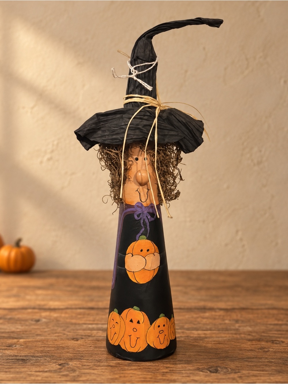 Black Witch Figurine with Pumpkin Design